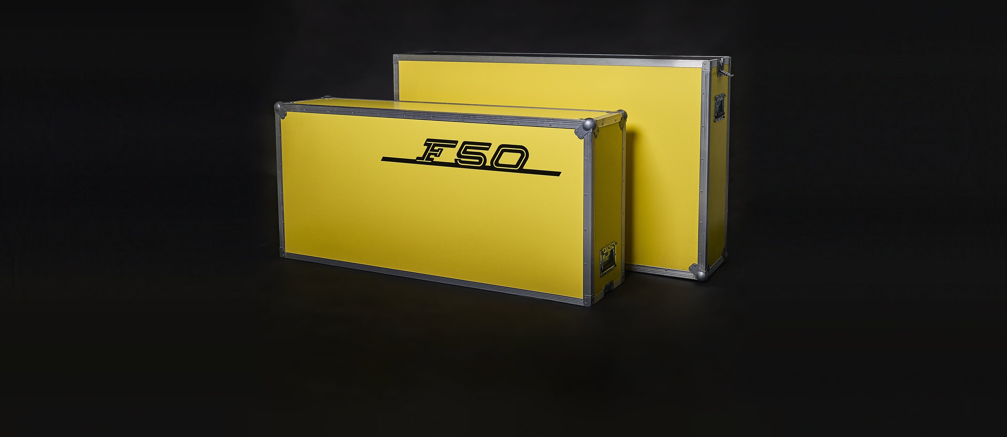 Yellow Ferrari F50 flight cases